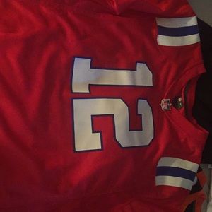 Tom Brady read and blue football jersey